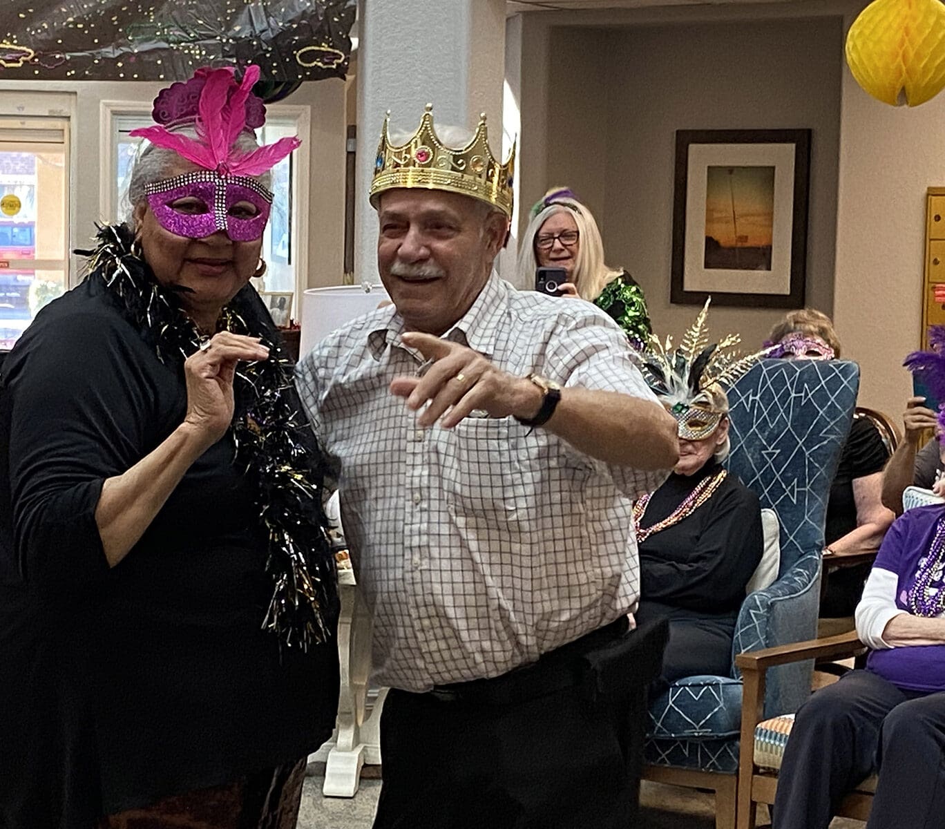 Residents in Mardi Gras eye mask and crown Lodi